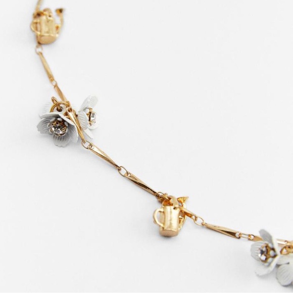 ZARA — Metal necklace with flower and watering can charms. - Picture 3 of 4